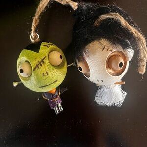 PIER 1 Set of two Halloween figurines. Frankenstein and bride of Frankenstein